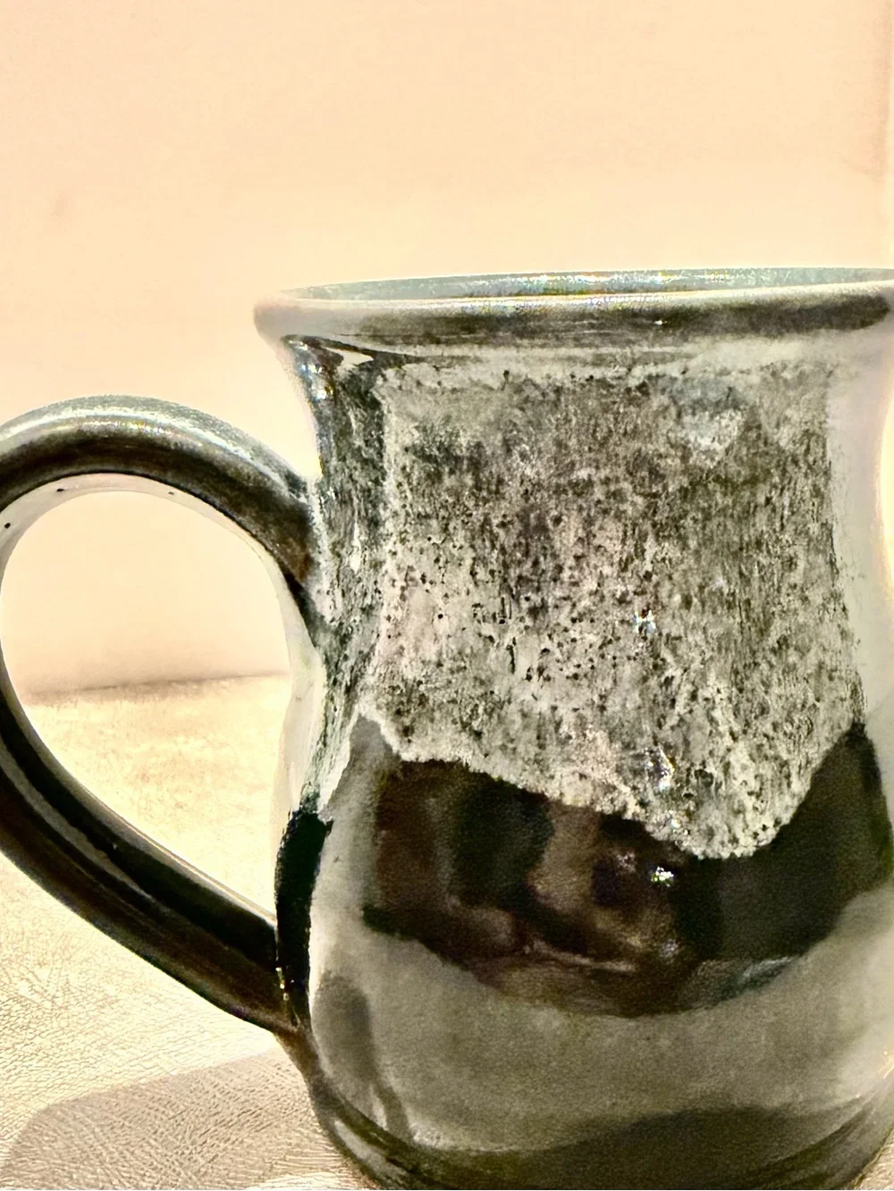 Hell’s Backbone Grill & Farm Deneen Pottery Bolder Utha Dark Green Ceramic Mug.